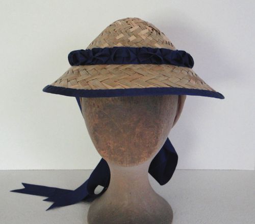 Another straw hat in the "Mandarin" style.